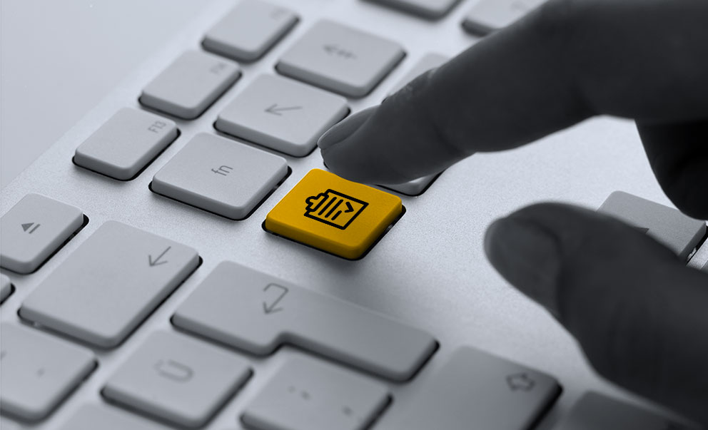 Person pressing a documents key on a keyboard