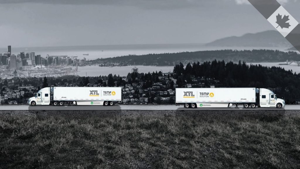 XTL Temp Control trucks face opposite, background is vancouver island to the far left and montreal on right.